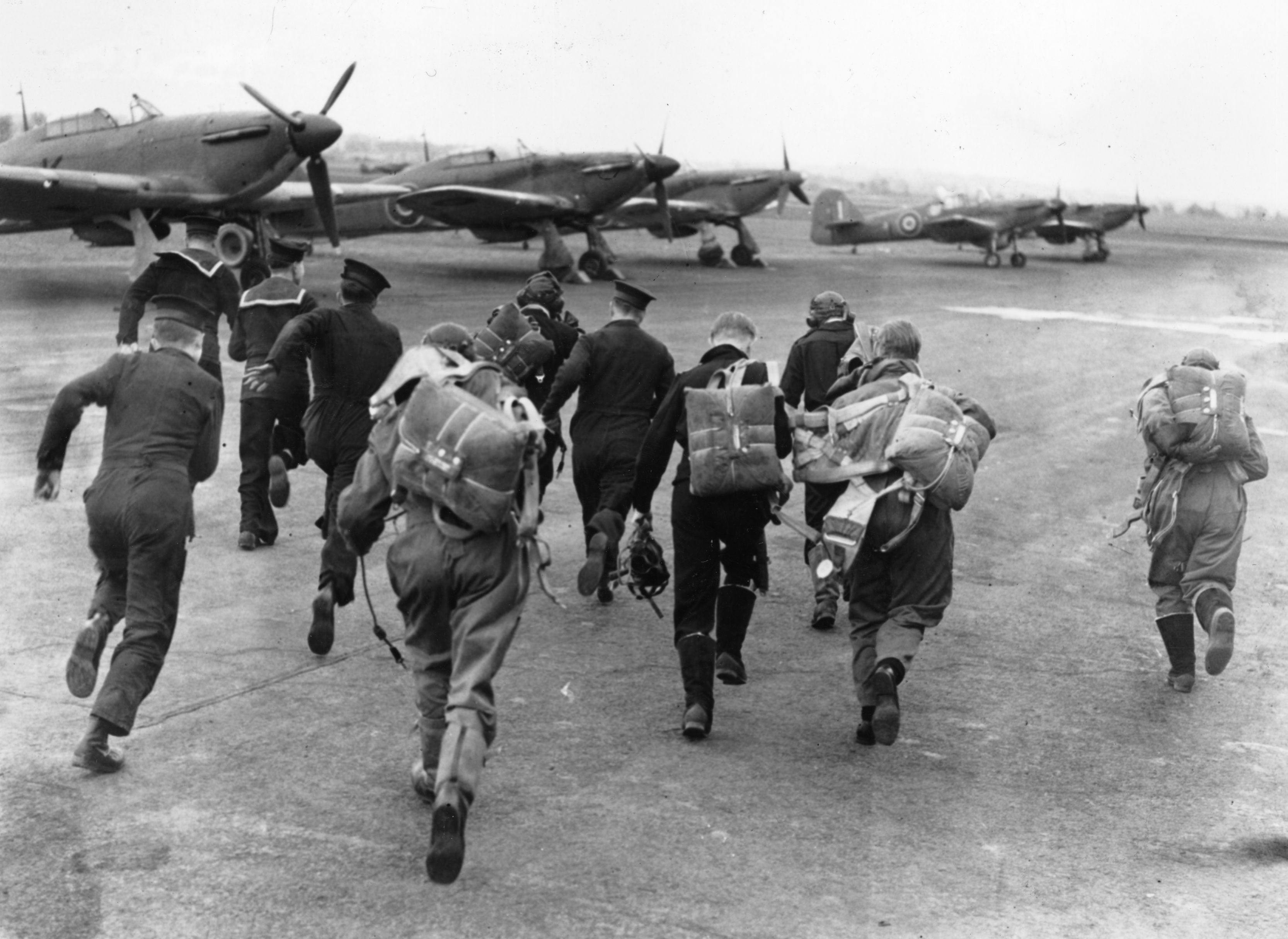 Soldiers scramble for their planes during an alert at a training centre for the Fleet Air Arm