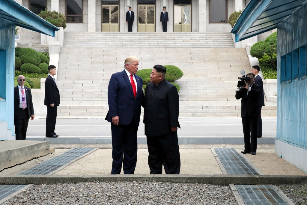 Kim Jong-un and President Donald Trump inside the demilitarised zone separating the South and North Korea on June 30, 2019 in Panmunjom, South Korea.&nbsp;