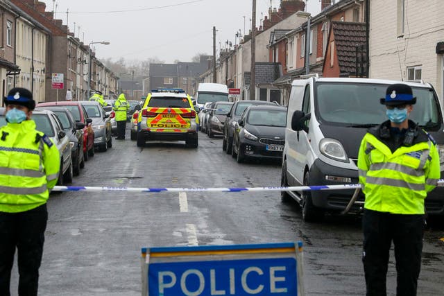 Police at the scene of the shooting in Summers Street, Swindon