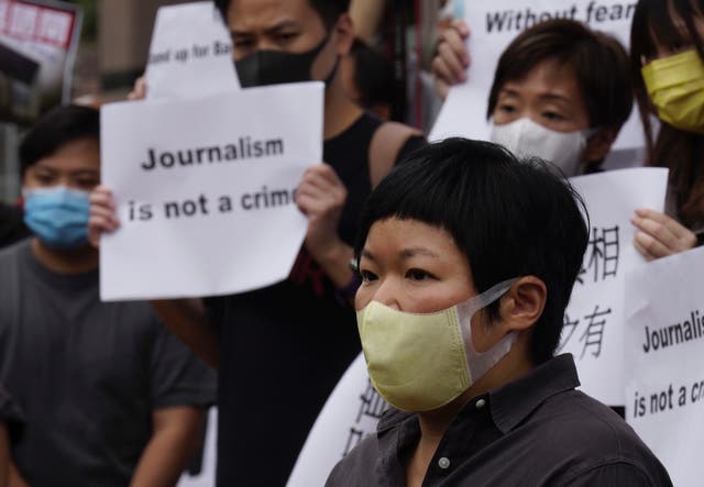 Hong Kong Journalist Charged