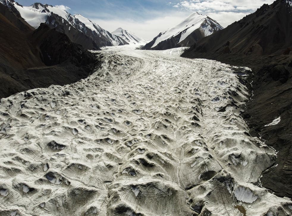 Rivulets of meltwater score the surface of the Laohugou No 12 glacier in the Qilian mountains