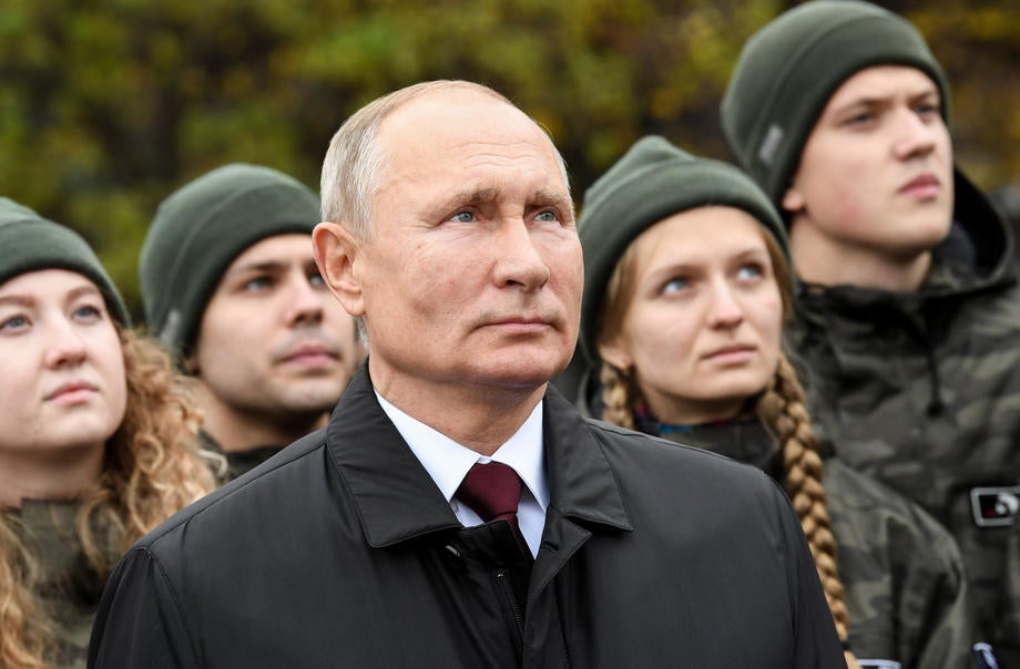 Vladimir Putin and members of youth organisations attend a flowers-laying ceremony on the National Unity Day in Moscow, Russia on November 4