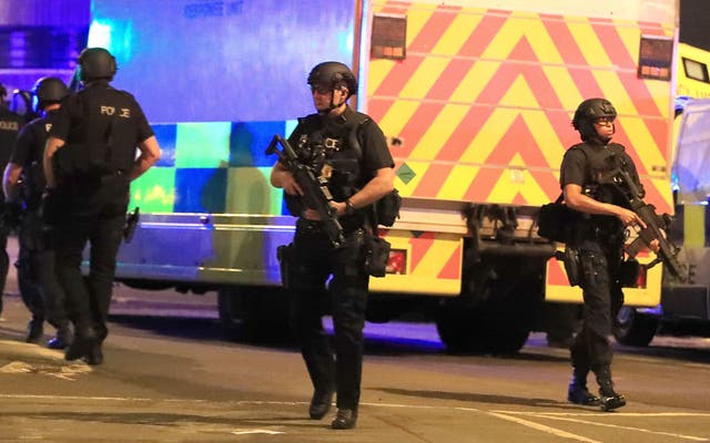<p>Armed police close to the Manchester Arena after the terror attack at an Ariana Grande concert in 2017</p>