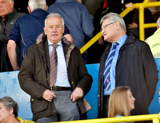 Rick Parry (left) has pleaded for government support until fans are allowed to return to matches