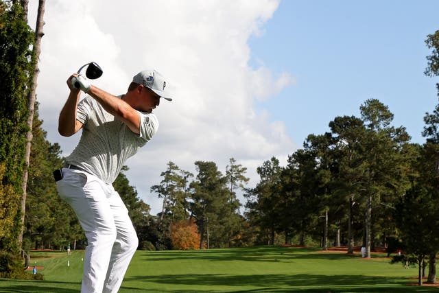 Bryson DeChambeau drives from the 17th tee during a practice round prior to the Masters