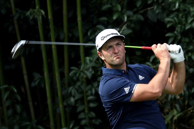 <p>Jon Rahm of Spain hits his tee shot during a practice round prior to the Masters</p>