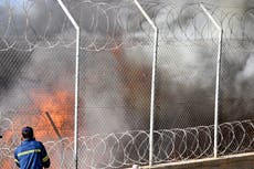 Fire burns tents, structures in Greek refugee camp