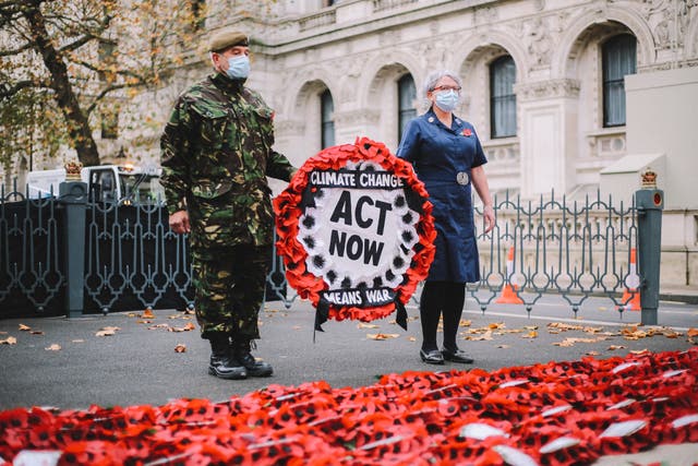 <p>Protest: veteran Donald Bell lays XR wreath at the Cenotaph on Remembrance Day</p>