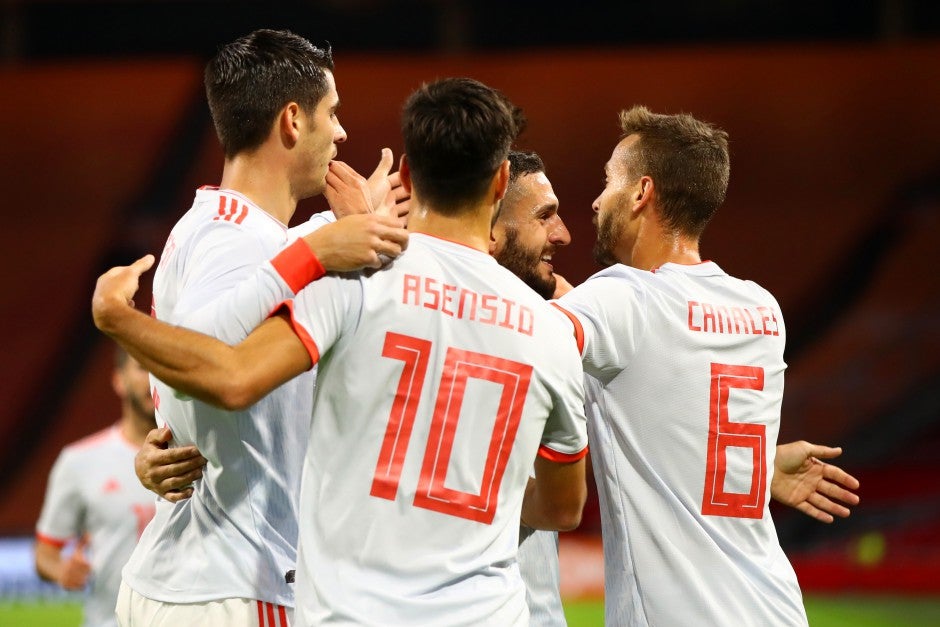 Spain celebrate scoring against the Netherlands