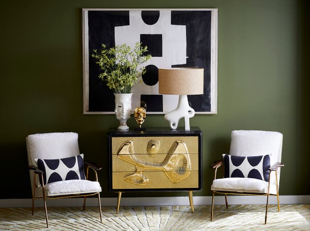 <p>Living room - Reform three drawer dresser, Paradox table lamp, Gilded Dora Maar urn, Ingmar chairs, shearling</p>