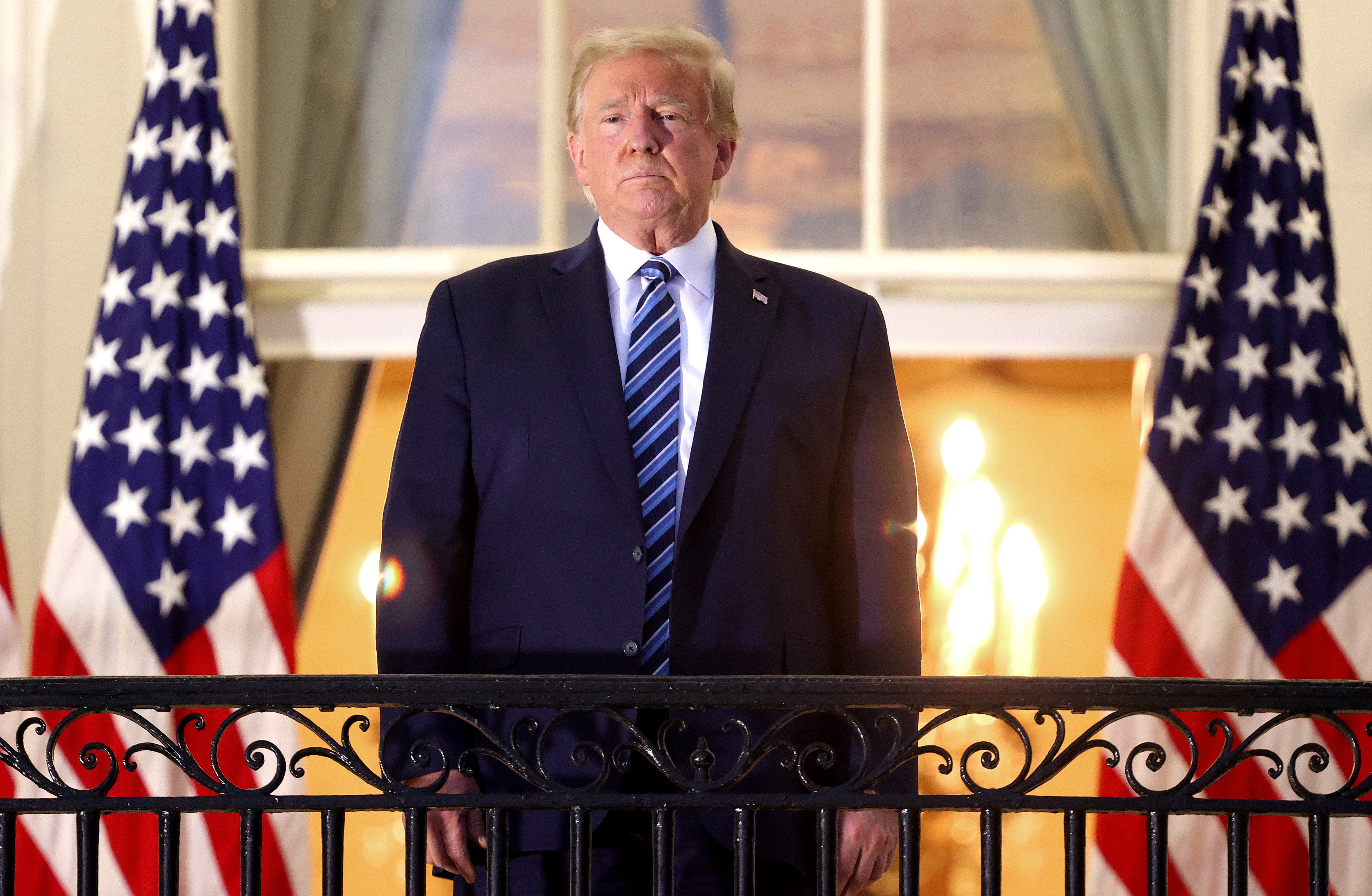 Donald Trump stands on the Truman Balcony