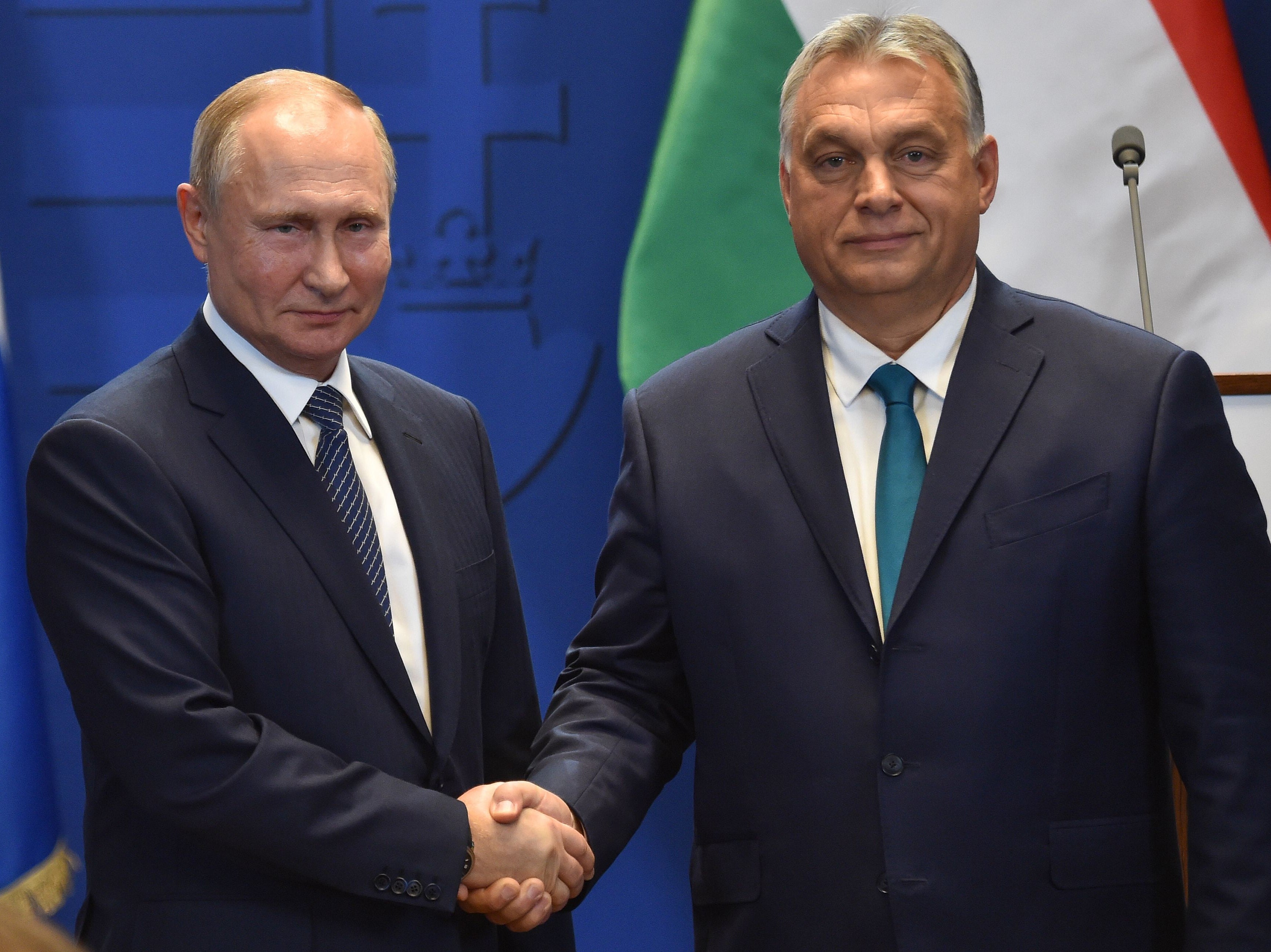 Russia’s Vladimir Putin and Hungary’s Viktor Orban shake hands after a meeting in Budapest in 2019