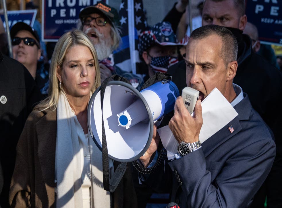Former campaign adviser to U.S. President Donald Trump, Corey Lewandowski (R) and former Florida Attorney General Pam Bondi speak to the media about a court order giving the Trump campaign access to observe vote counting operations on November 5, 2020 in Philadelphia, Pennsylvania. With no winner yet declared in the presidential election, all eyes are on the outcome of a few remaining swing states.