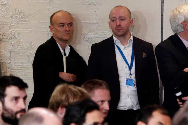 <p>Dominic Cummings (left) and Lee Cain at a Boris Johnson press conference</p>