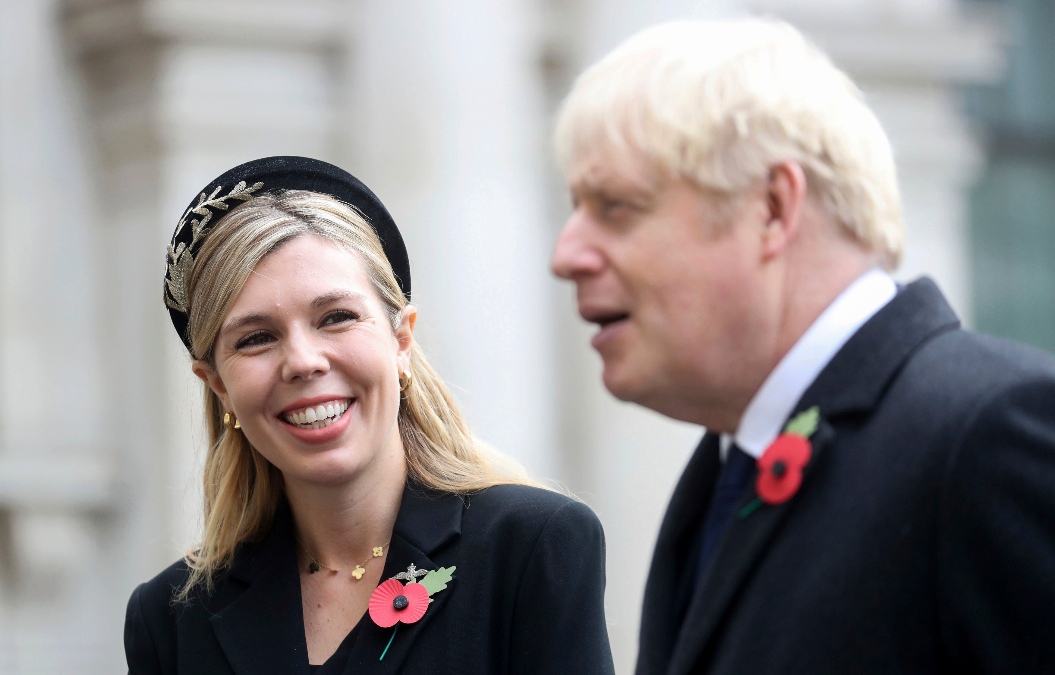 Boris Johnson and his fiancée Carrie Symonds attend the Remembrance service at the Cenotaph on Sunday