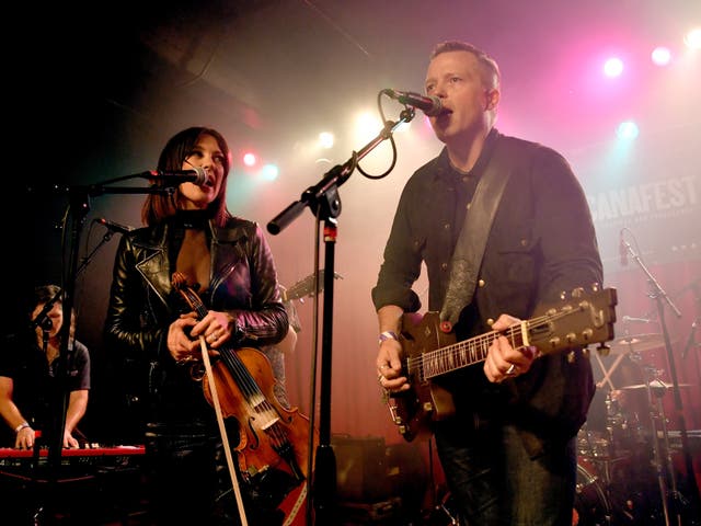 Jason Isbell and Amanda Shires performing together on-stage in September 2018