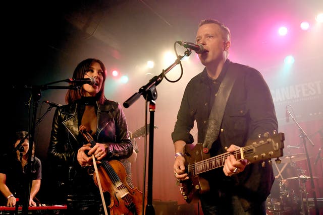Jason Isbell and Amanda Shires performing together on-stage in September 2018