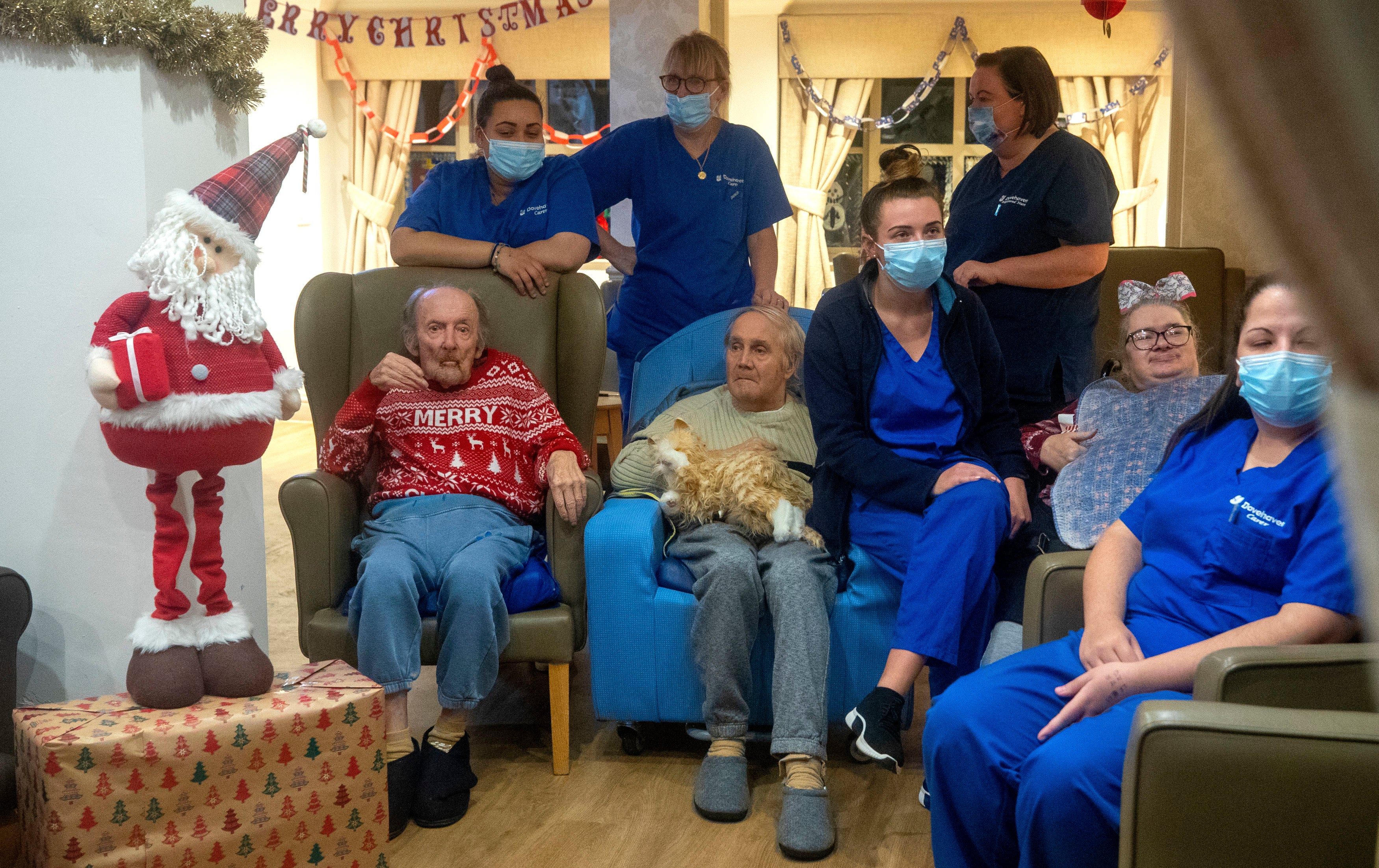 Residents and care workers at Churchview Nursing Home in Liverpool watch a video of this year's christmas lights switch on in Liverpool city centre.