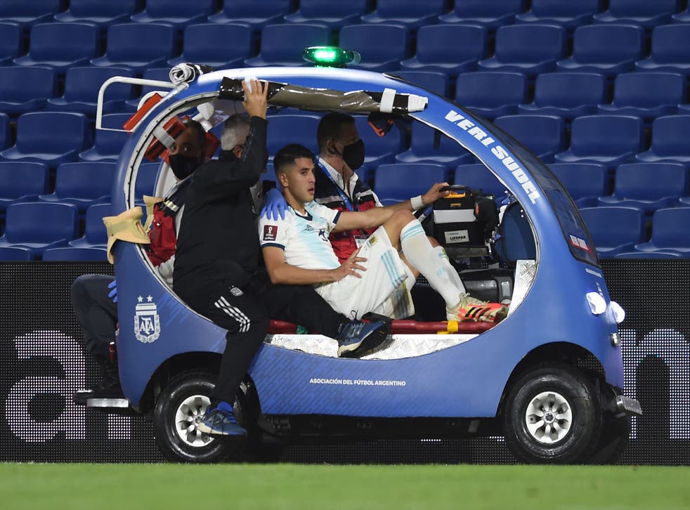 Argentina’s Exequiel Palacios is taken out of the field in a cart after getting injured during the closed-door 2022 FIFA World Cup South American qualifier football match against Paraguay at La Bombonera Stadium in Buenos Aires on November 12, 2020.