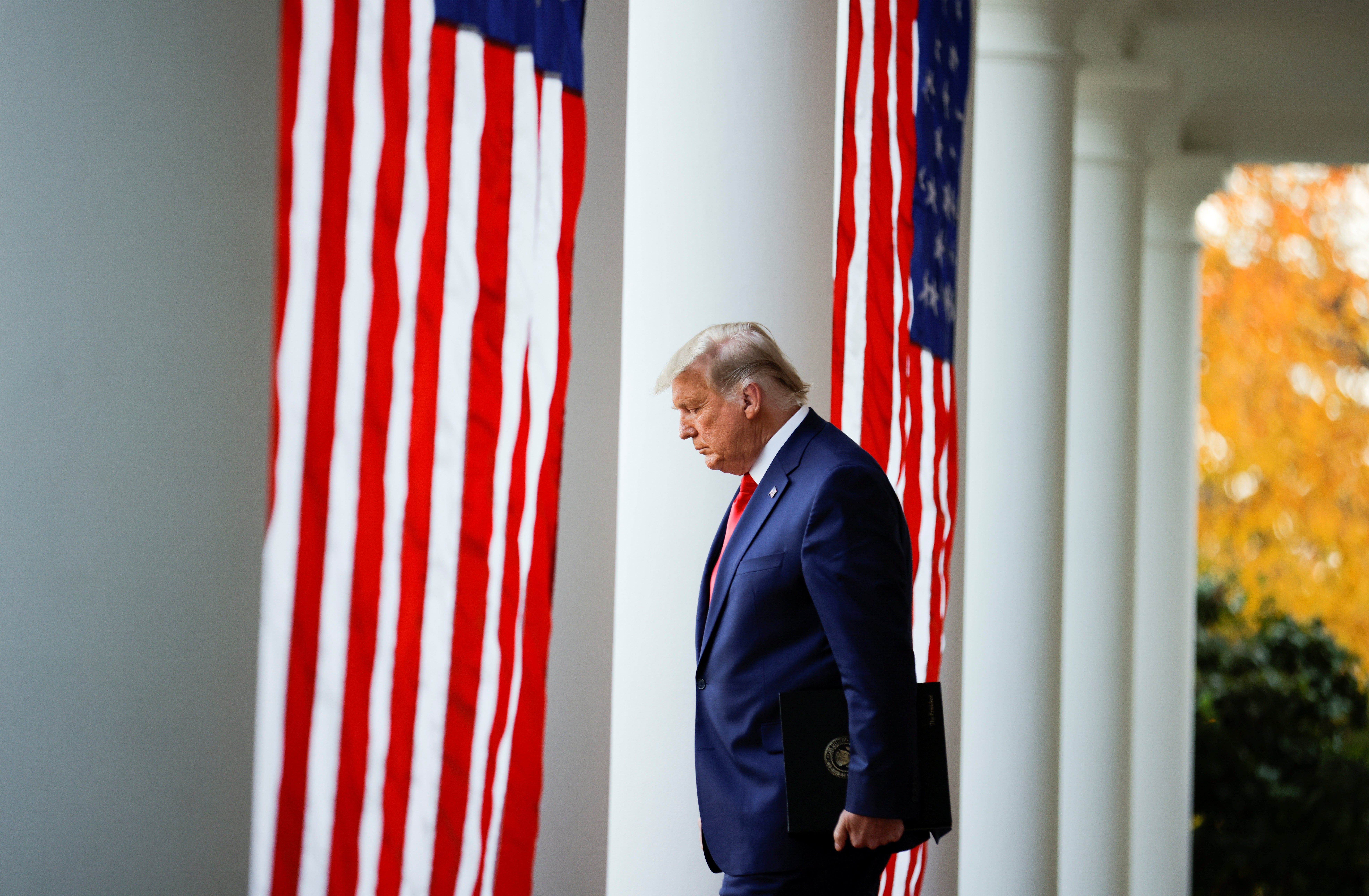 <p>President Donald Trump walks down the West Wing colonnade to the Rose Garden to deliver an update on the so-called "Operation Warp Speed" effort to develop a coronavirus vaccine. REUTERS/Carlos Barria</p>
