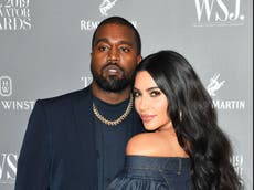 Kim Kardashian shares video crying over hologram of late father