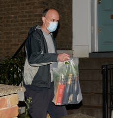 Dominic Cummings pictured arriving home with champagne