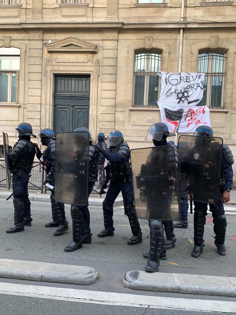 School’s out: French riot police outside the Lycee Colbert, central Paris last week