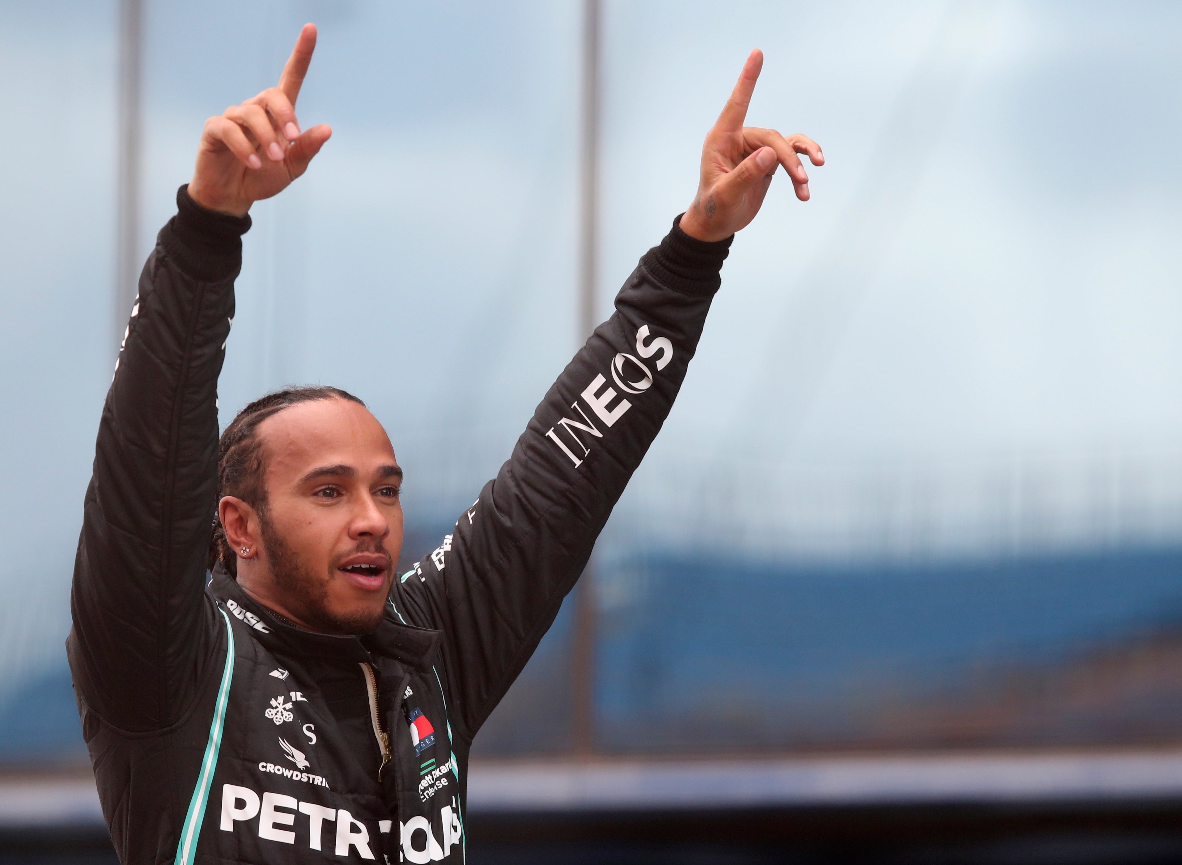 Lewis Hamilton celebrates winning the Turkish Grand Prix and with it a seventh world championship