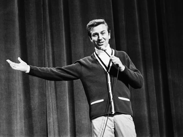 <p>Des O’Connor on stage at the Royal Variety Show in 1966</p>