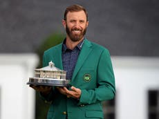 Johnson clinches victory at The Masters with record-breaking score