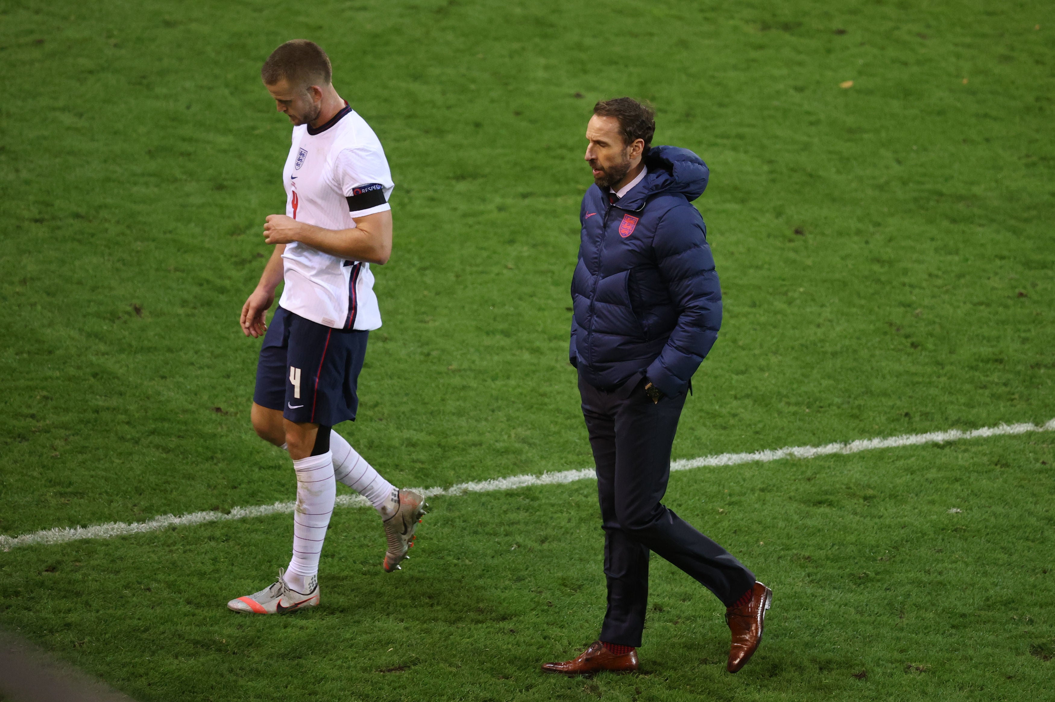 Eric Dier and Gareth Southgate walk away at full-time