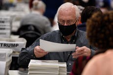 Hand tally of Georgia presidential race continues