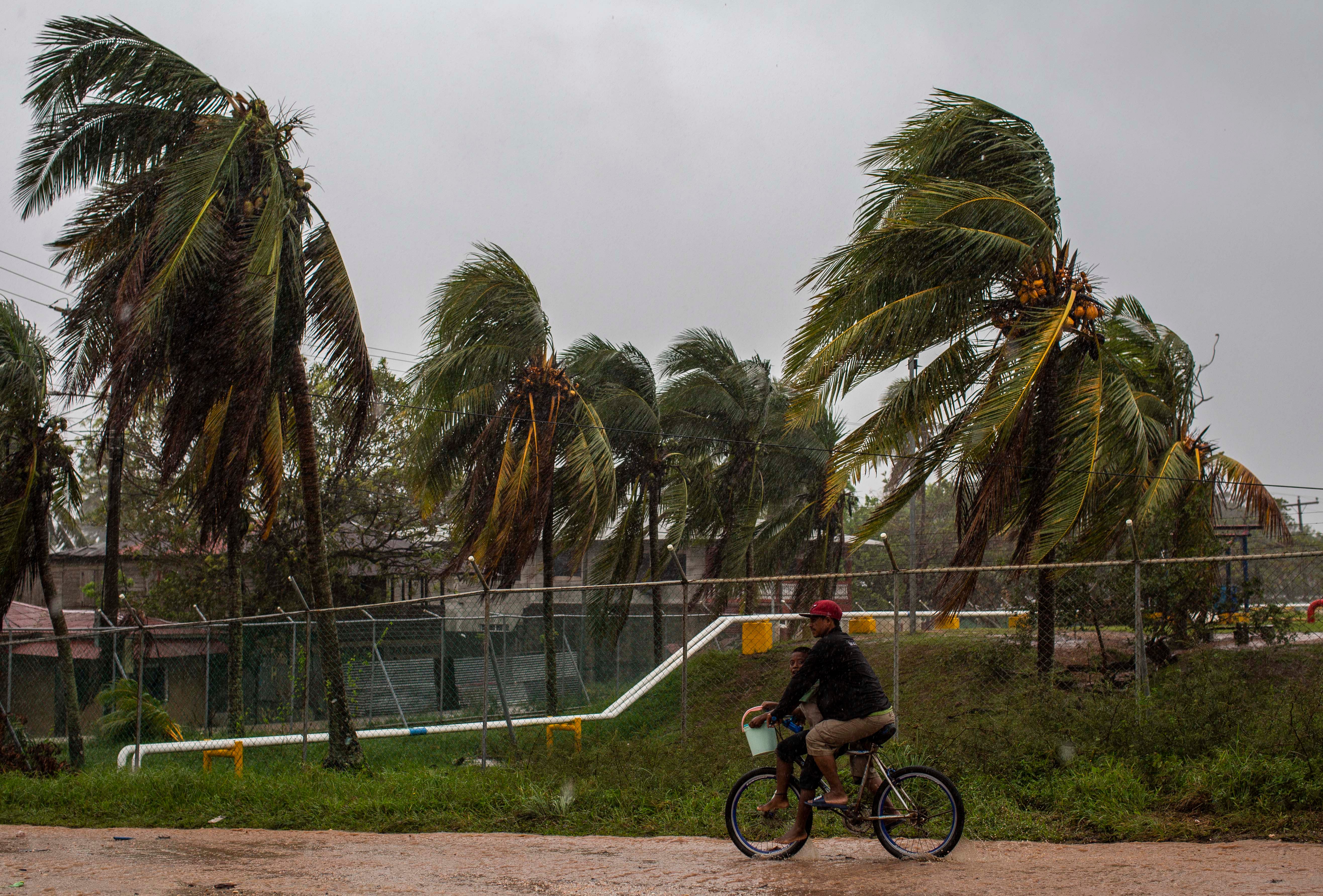 Hurricane Iota strengthened into a "catastrophic" Category 5 hurricane and was set to slam into Central America late Monday, threatening areas devastated by a powerful storm just two weeks ago