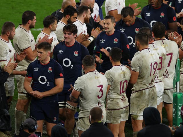 England are congratulated by opposition players after beating Georgia