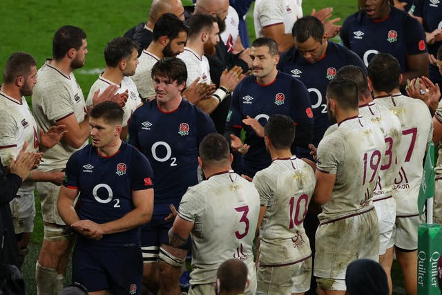England are congratulated by opposition players after beating Georgia