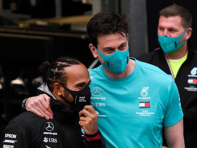 Seven-time Formula One champion Lewis Hamilton (left) with Mercedes boss Toto Wolff