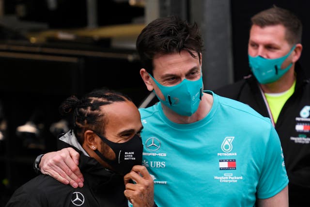 Seven-time Formula One champion Lewis Hamilton (left) with Mercedes boss Toto Wolff