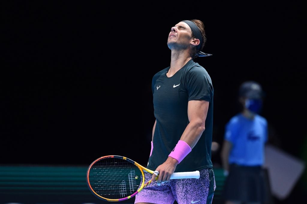 Rafael Nadal reacts during the defeat