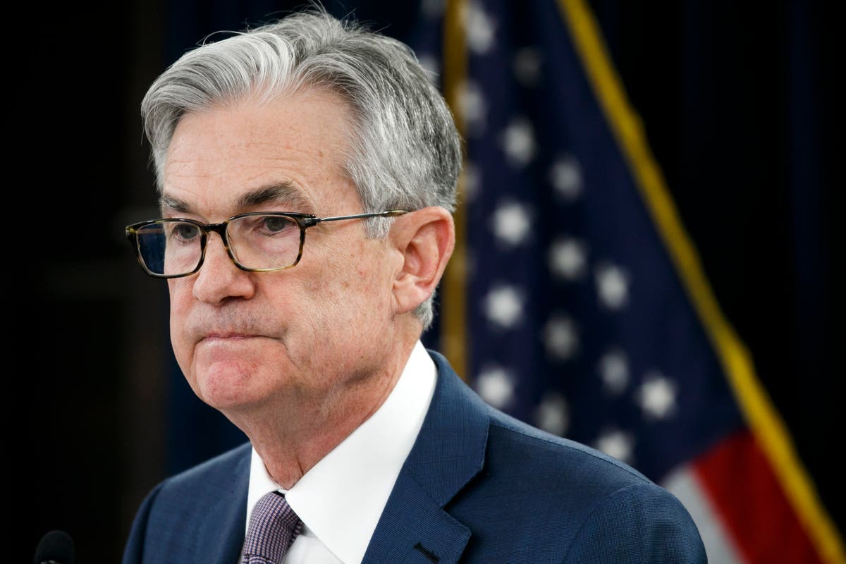 Fed's Powell says surge in virus cases threatens US economy