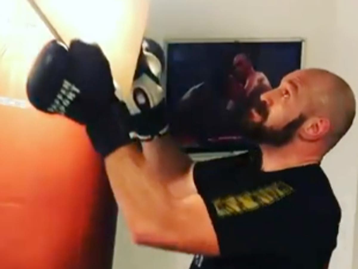 Tyson Fury smashes heavy bag until ceiling collapses