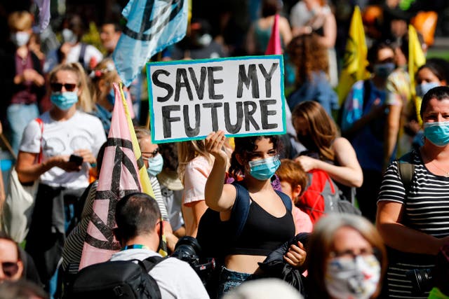 <p>Protesters calling for action on the climate crisis earlier this year</p>