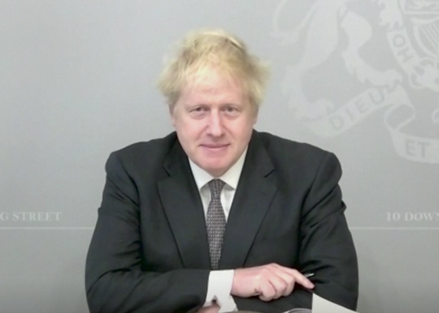 <p>Boris Johnson takes part in PMQs by video link on Wednesday</p>