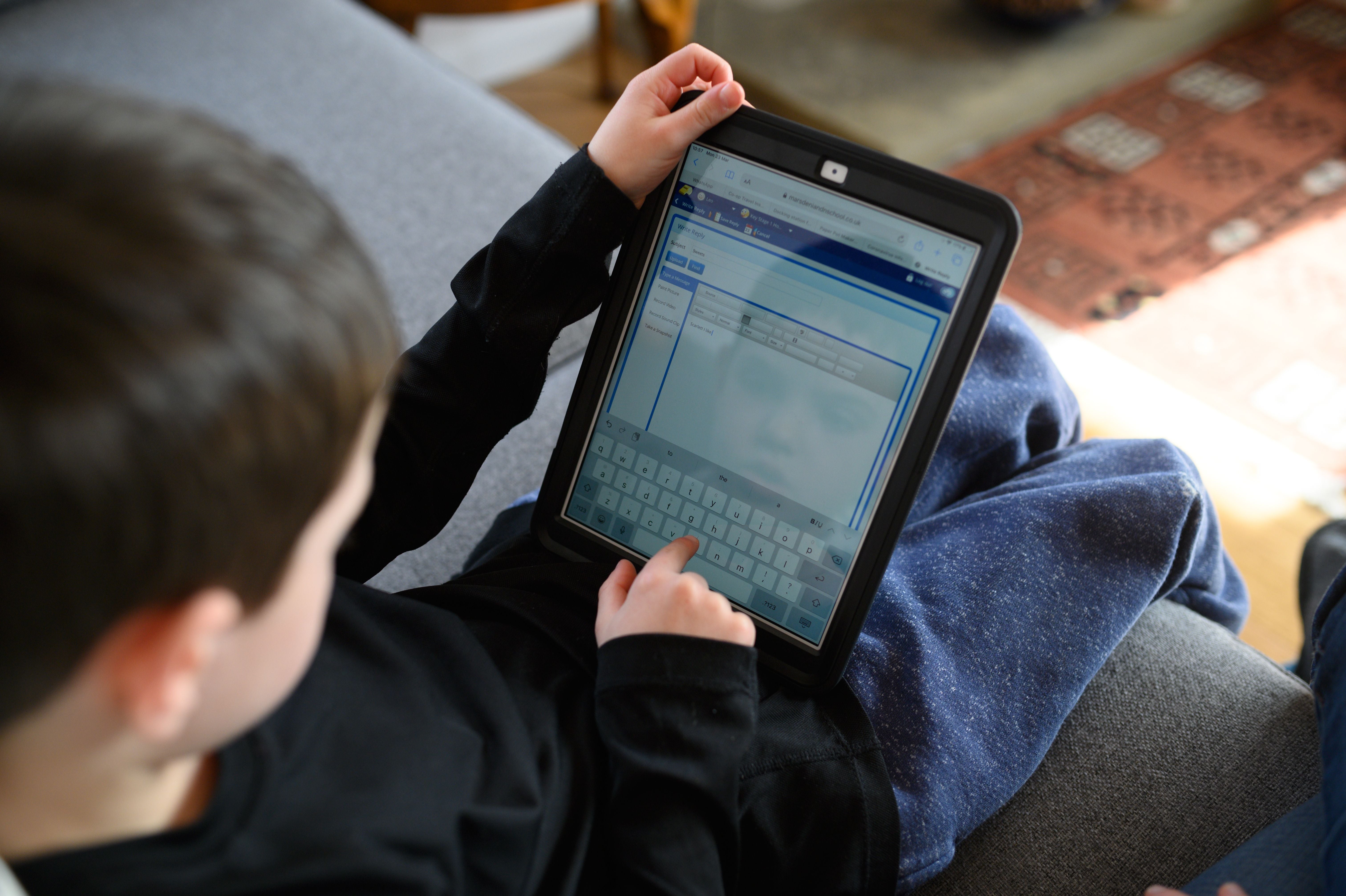 A child uses a tablet