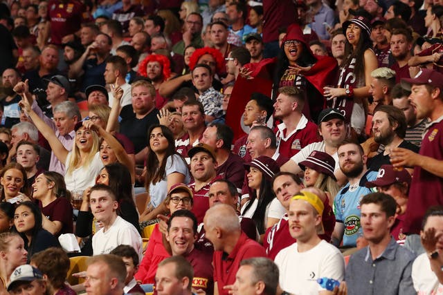 Crowds cheer during game three of the State of Origin series between the Queensland Maroons and the New South Wales Blues at Suncorp Stadium