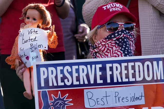 <p>A supporter of President Donald Trump during a post-election rally in Milwaukee</p>