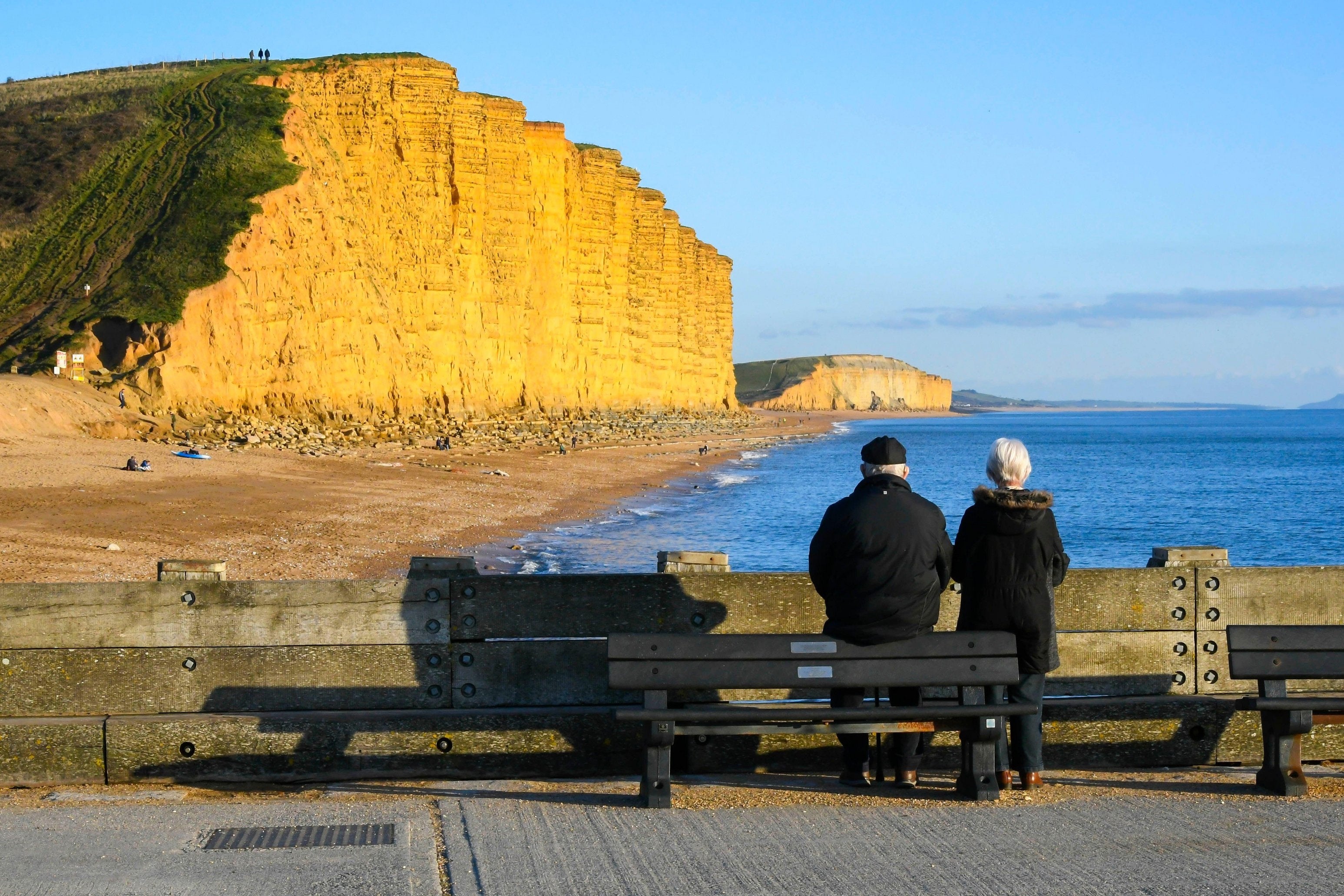 Couple enjoying winter sunshine under lockdown in Dorset