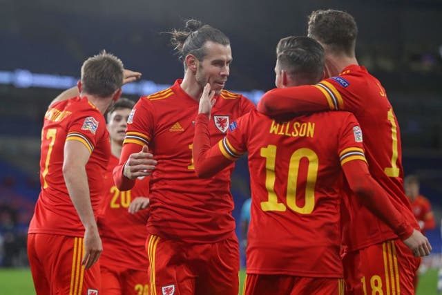 Wales celebrate scoring against Finland