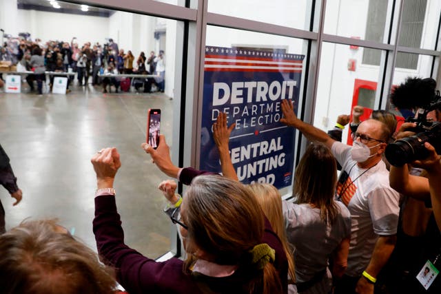 <p>Protestors outside a vote-counting facility in Detroit</p>