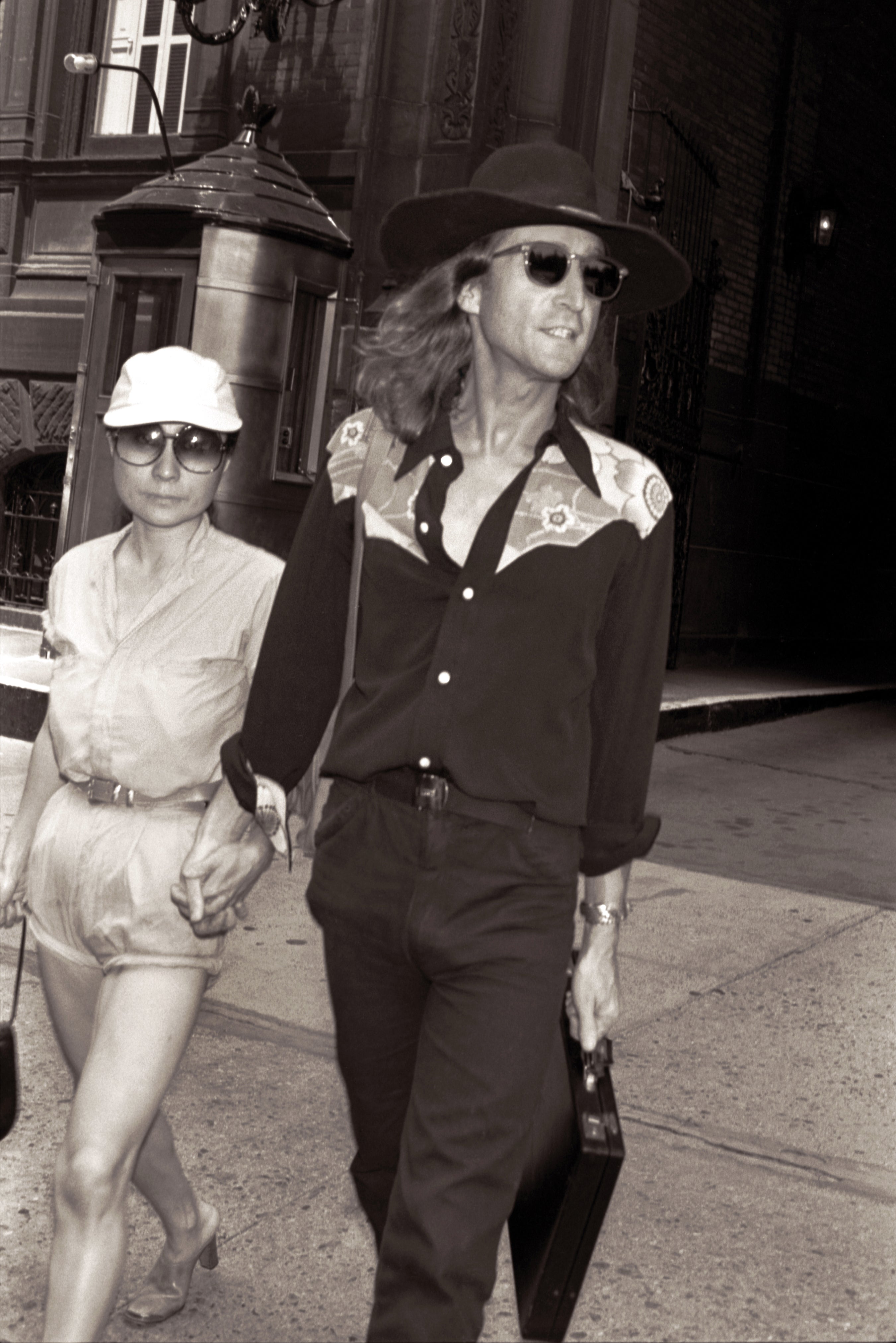 Lennon holds Ono’s hand on the way to his first day of work on ‘Double Fantasy’