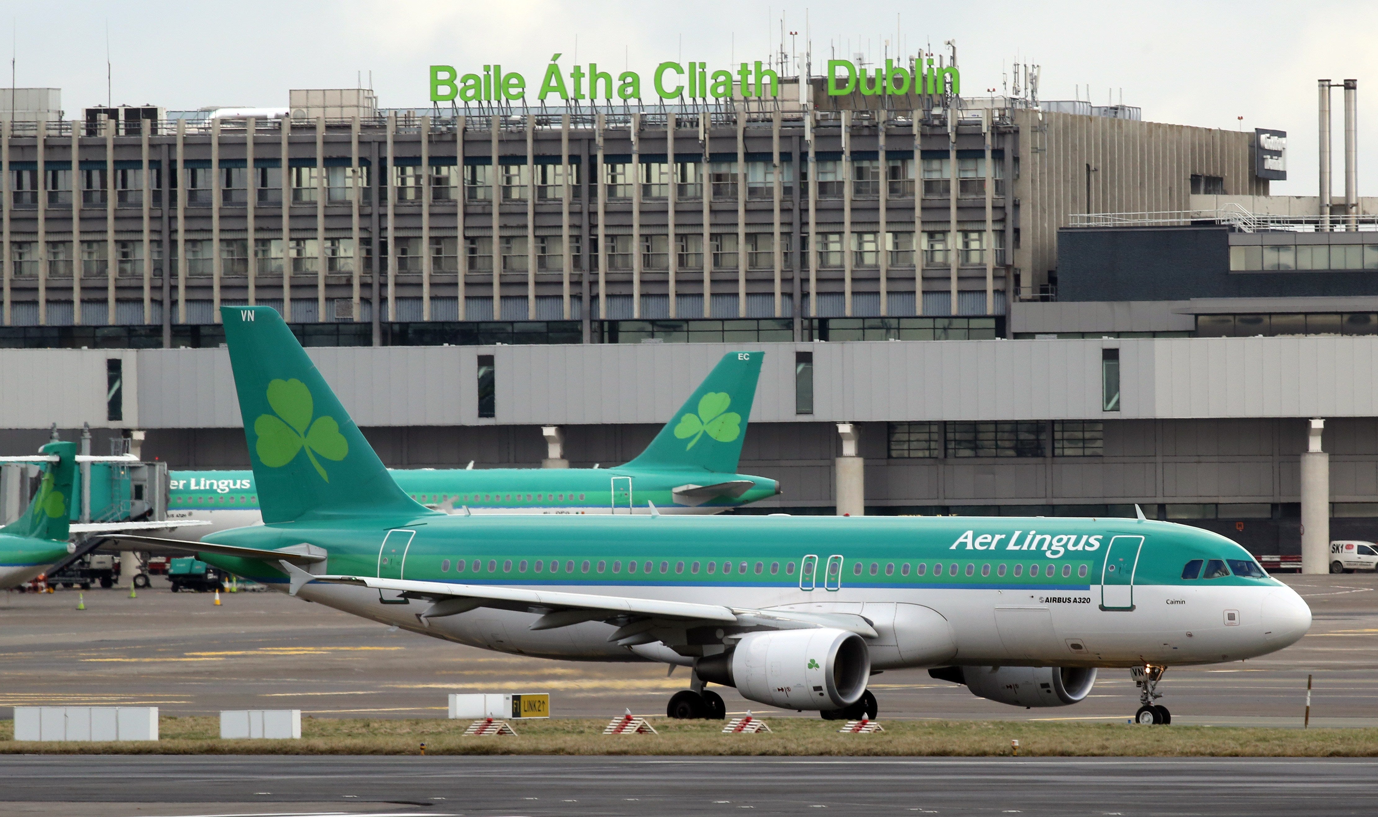 Aer Lingus passenger jets taxi at Dublin Airport in Ireland on January 27, 2015.
